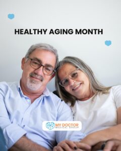 Elderly couple holding hands with 'Healthy Aging Month' title