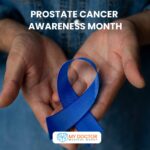 Hands holding a blue ribbon for Prostate Awareness Month