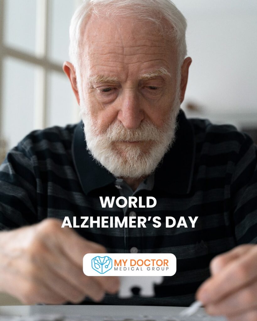 Elderly man engaging with a jigsaw puzzle, symbolizing cognitive engagement, with 'World Alzheimer’s Day' prominently displayed